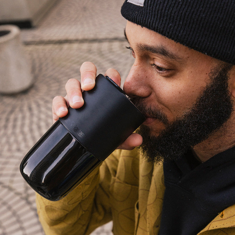 daily-on-the-go-set-z1 16oz_rise_tumbler_black_man_drink_square.jpg