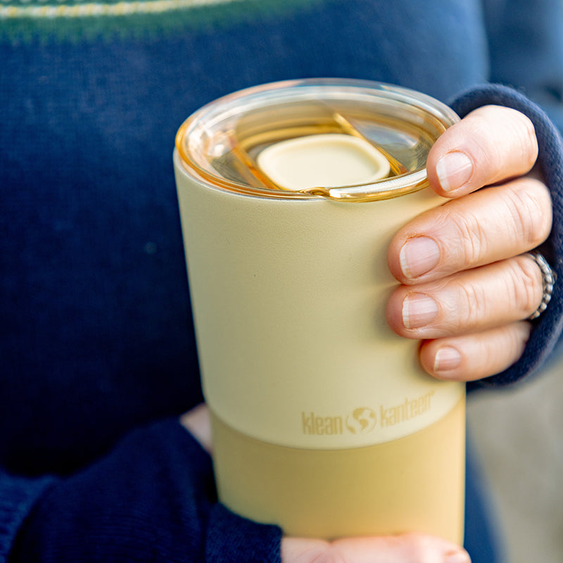 16oz-rise-tumbler-o2 16oz_rise_tumbler_wax_yellow_closeup_hand_lid_square.jpg