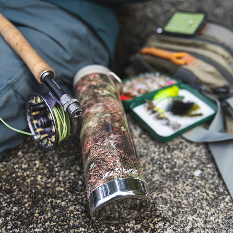 20oz-tkwide-with-cafe-cap-mossy-oak-r3 20oz_tumbler_mossyoak_rainbowtrout_flyfish_top_square.jpg
