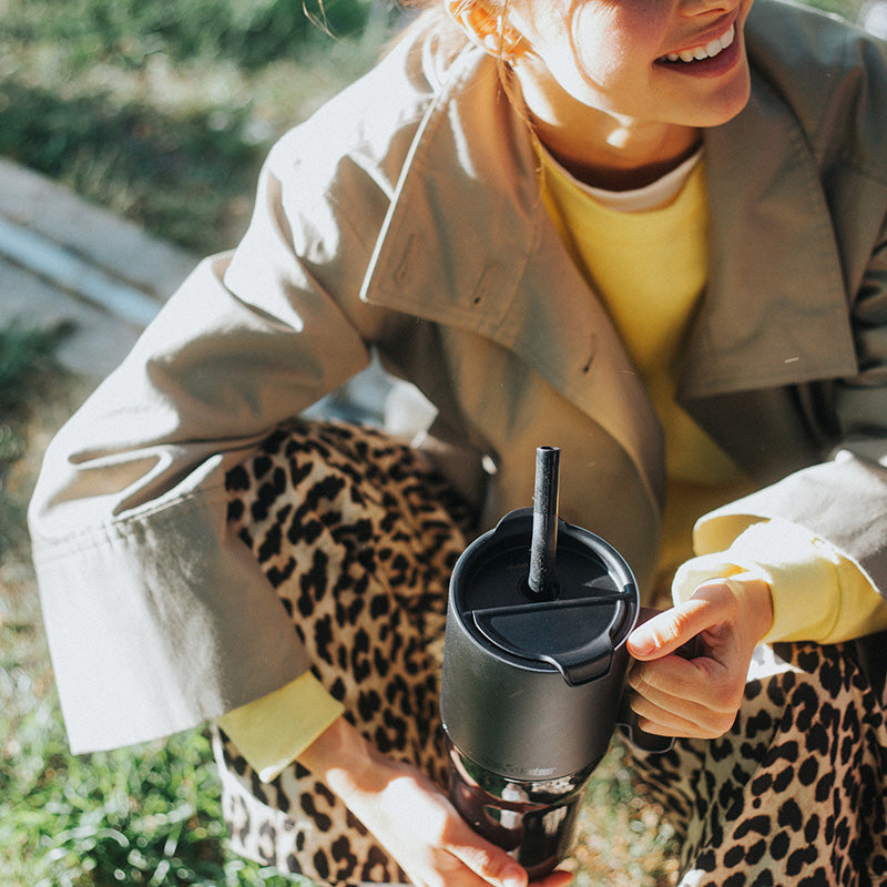 26oz-rise-tumbler-with-straw-lid-c9 26oz_rise_tumbler_black_woman_topview_square.jpg