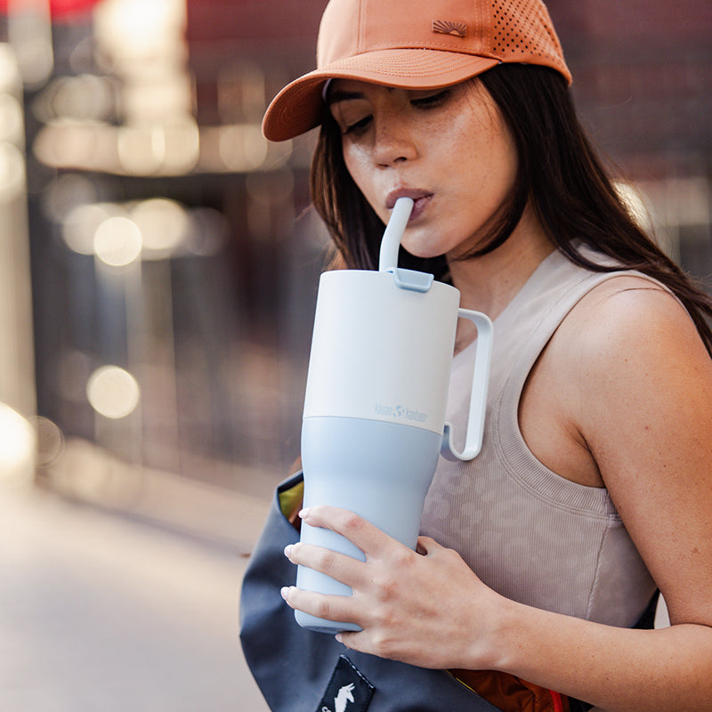 36oz-rise-tumbler-with-straw-lid-p9 36oz_rise_tumbler_straw_girl_sip_square.jpg