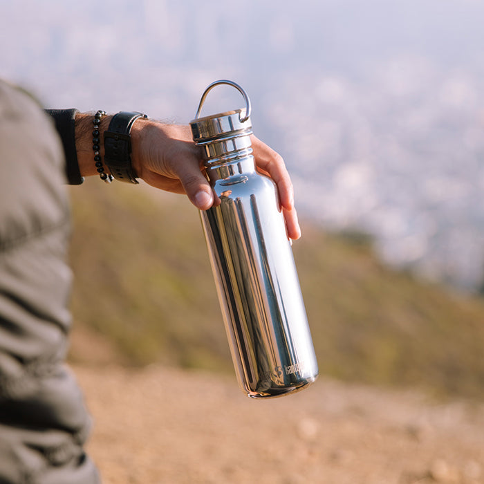 27oz-reflect-with-bamboo-cap-n7 K27SSLRF-MS-BAMBOO_reflect_bottle_hand_lifestyle.jpg